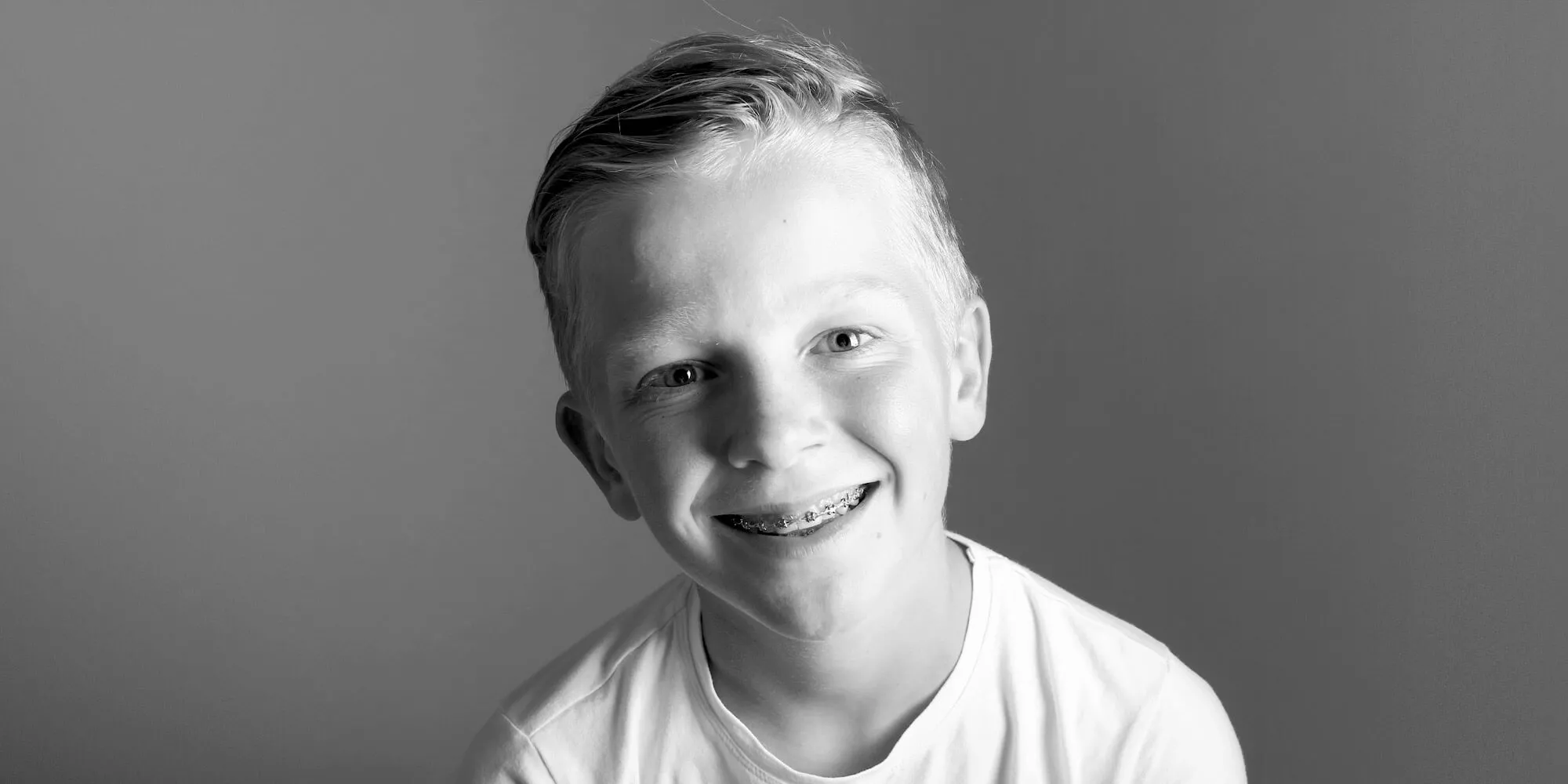 Smiling boy with braces